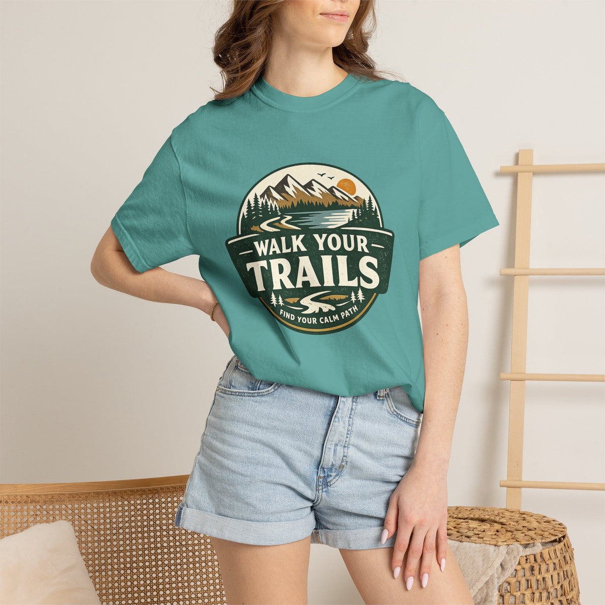 Unisex Garment Dyed T-Shirt, Person wearing a teal t-shirt with &