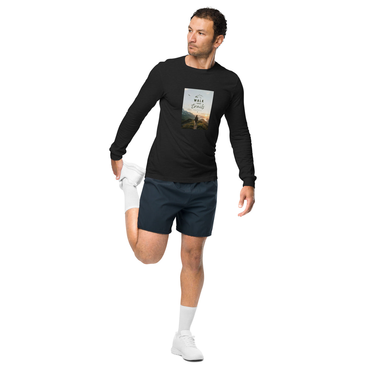 Unisex Long Sleeve Tee, Man wearing a black long-sleeve shirt with a graphic design on a white background