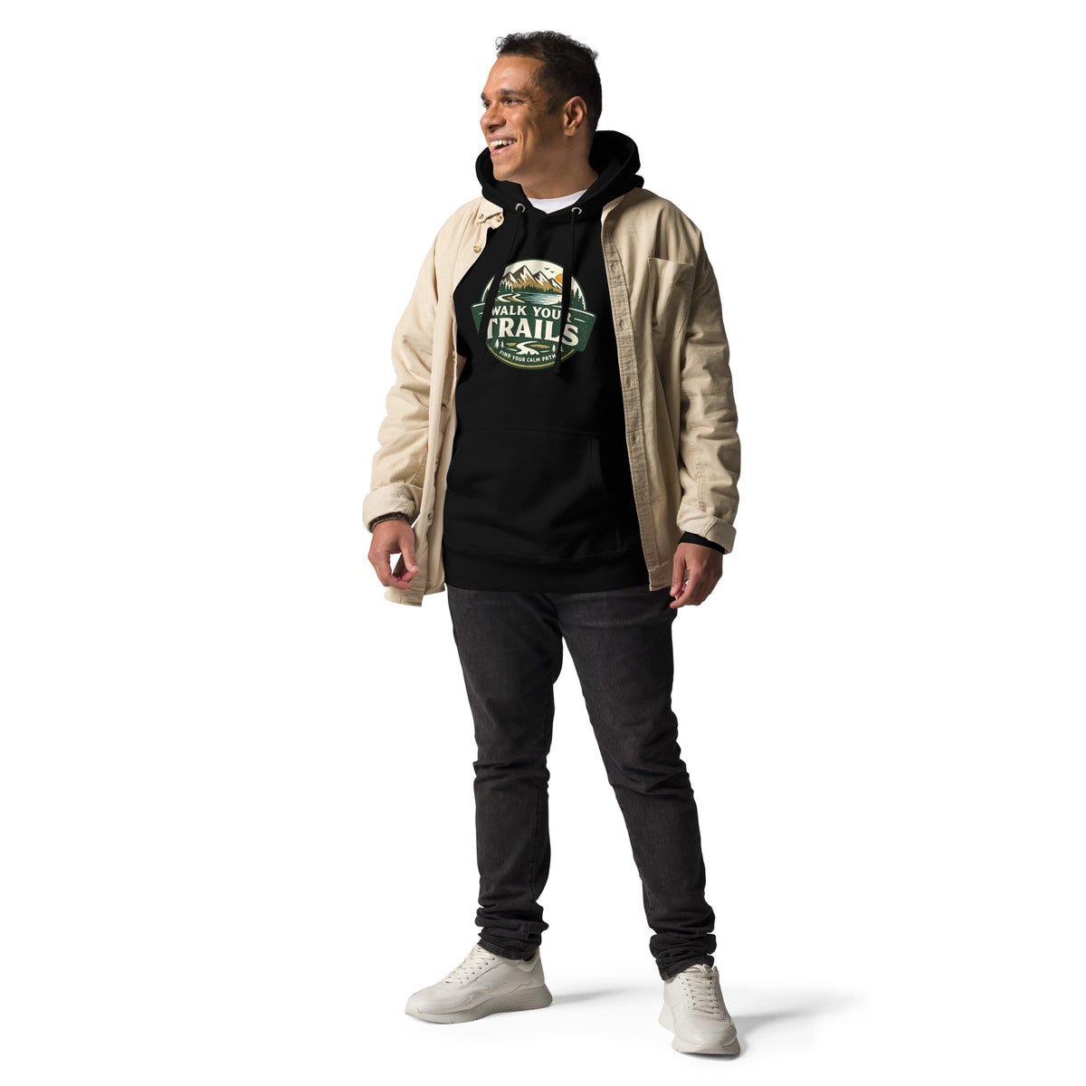 Unisex Hoodie Soft Warm Classic Fit, Man wearing a beige jacket, black hoodie with a colorful graphic, and dark jeans on a white background