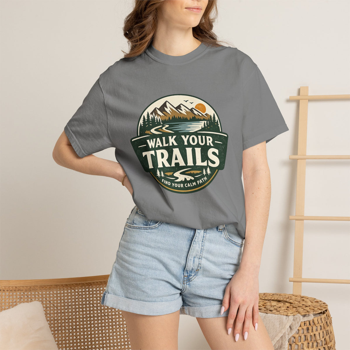 Unisex Garment Dyed T-Shirt, Person wearing a gray t-shirt with &