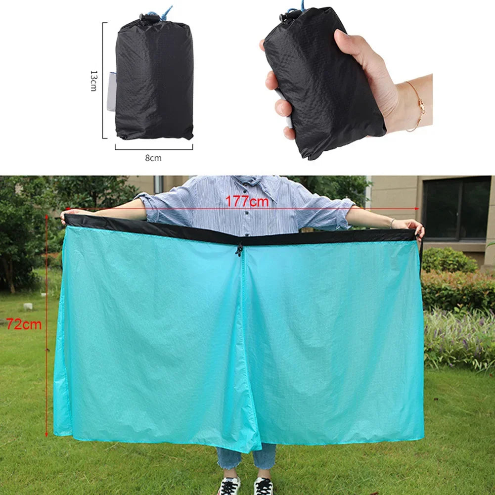 Black bag being held, unfolded blue tarp with measurements, and black bag dimensions shown.