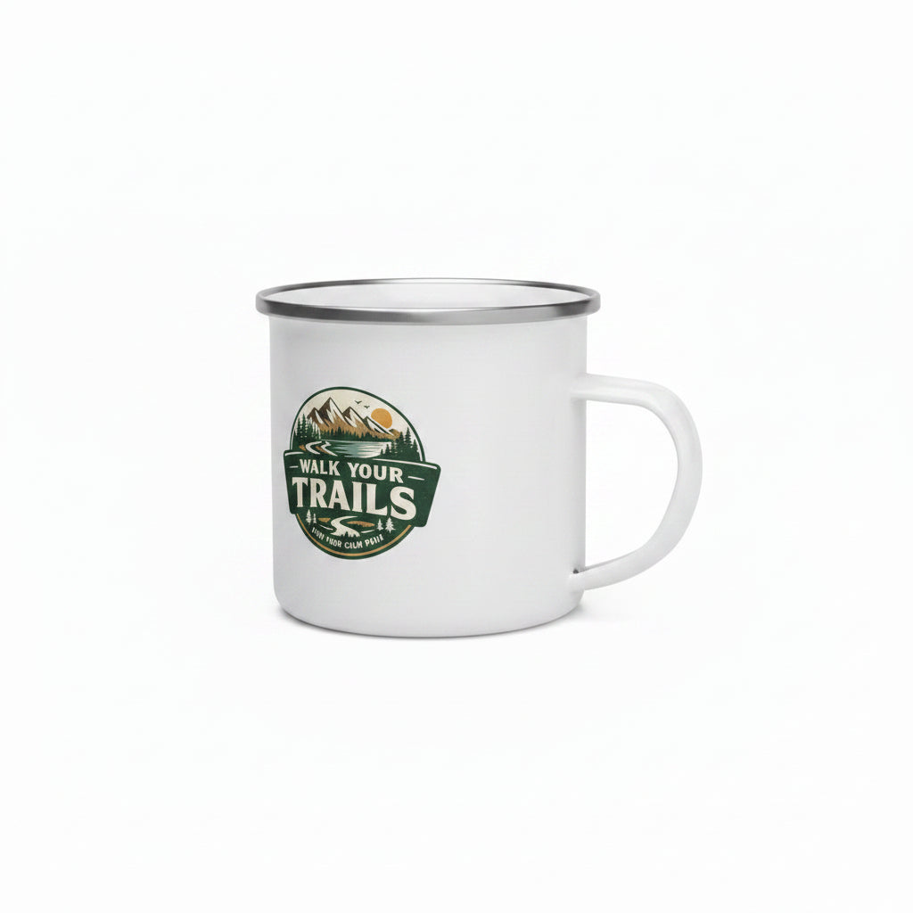 Enamel Mug A white enamel camp mug with a silver metal rim and handle, featuring a circular &