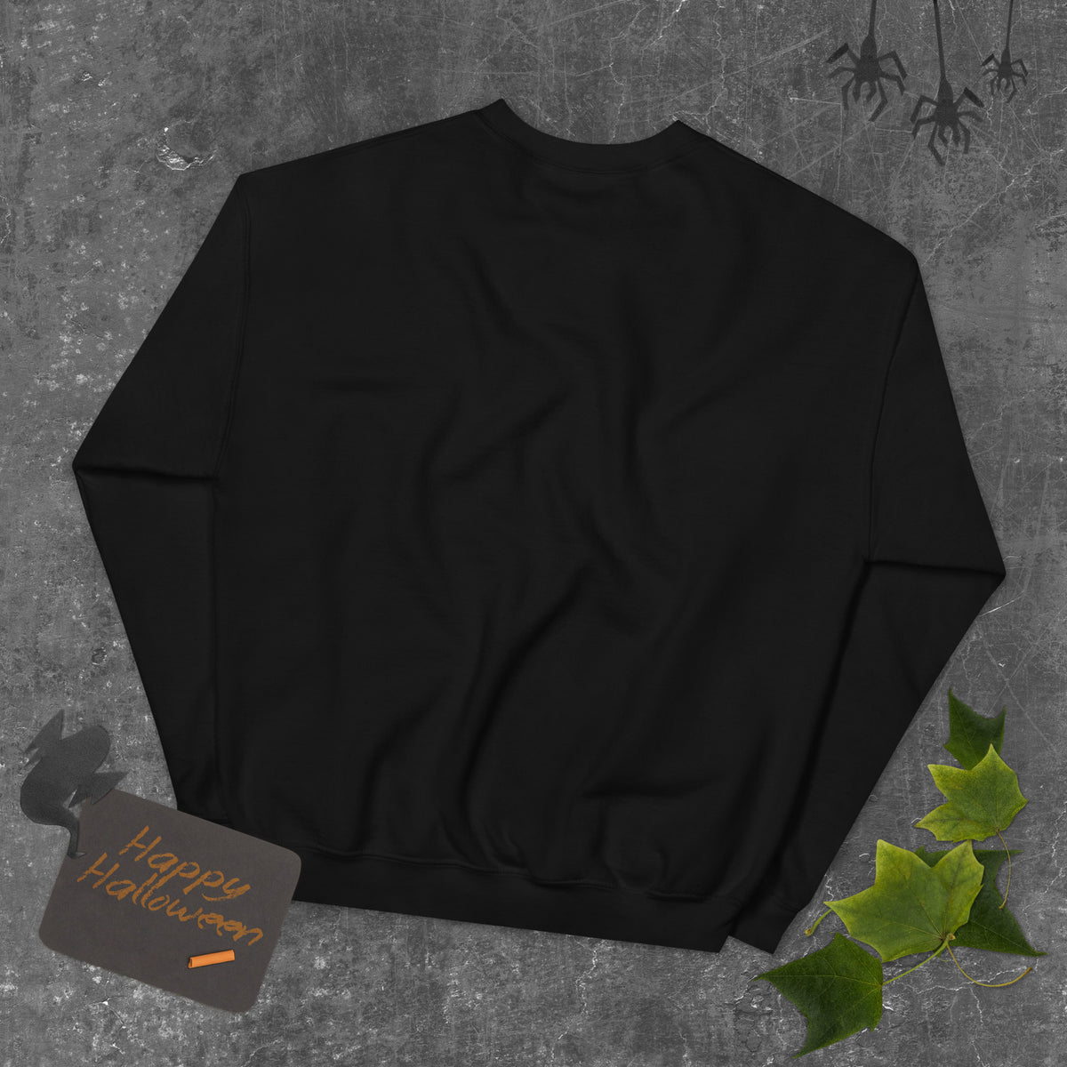 Comfortable Sweatshirt, Black sweatshirt on a textured gray background with a &