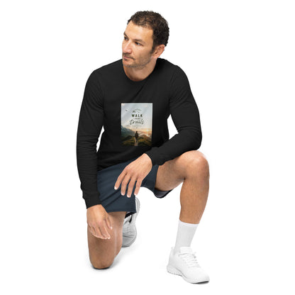 Unisex Long Sleeve Tee, Man wearing a black long-sleeve shirt with a graphic design on a white background