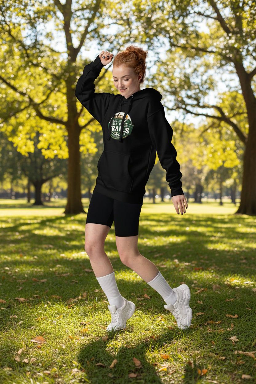 Unisex Hoodie Soft Warm Classic Fit, Person wearing a black hoodie with a graphic design on a white background