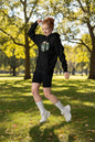 “Unisex hoodie in black with front pouch pocket.”